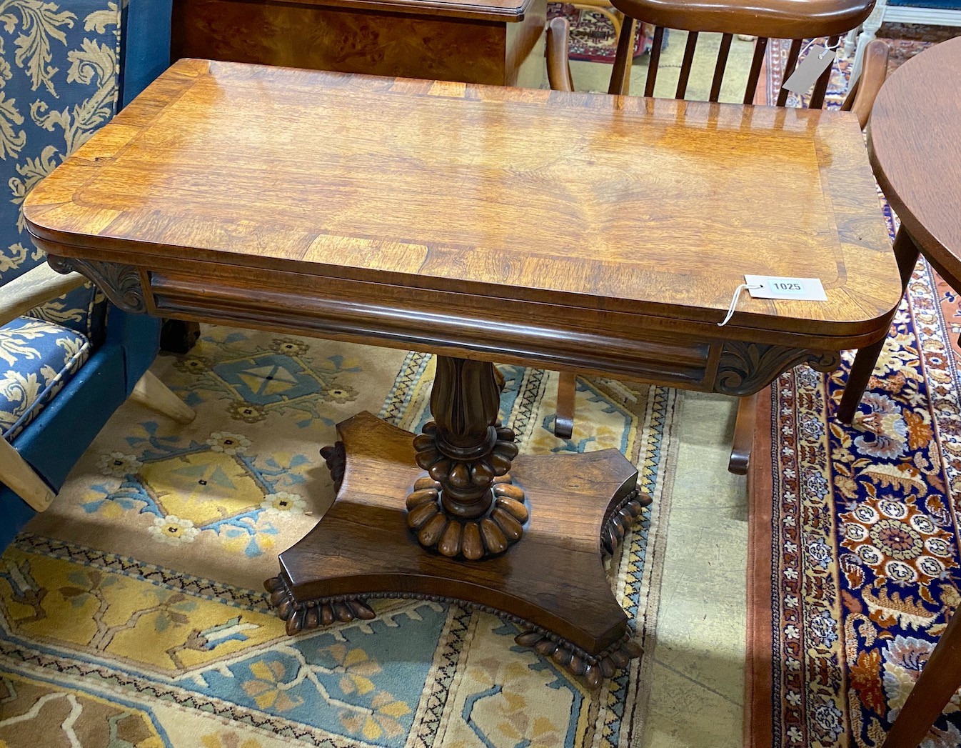 A William IV rosewood folding card table, width 92cm, depth 45cm, height 74cm